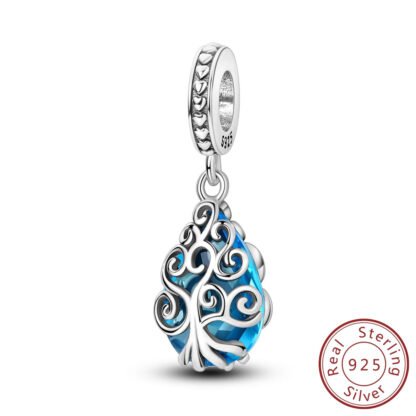 Silver Ornate Curves Blue Droplet Charm